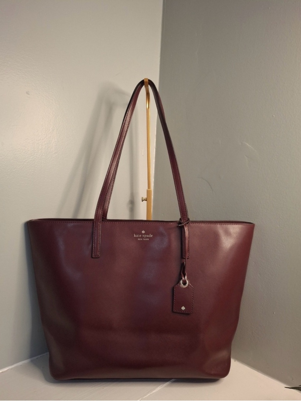 kate spade burgundy leather tote with hang tag